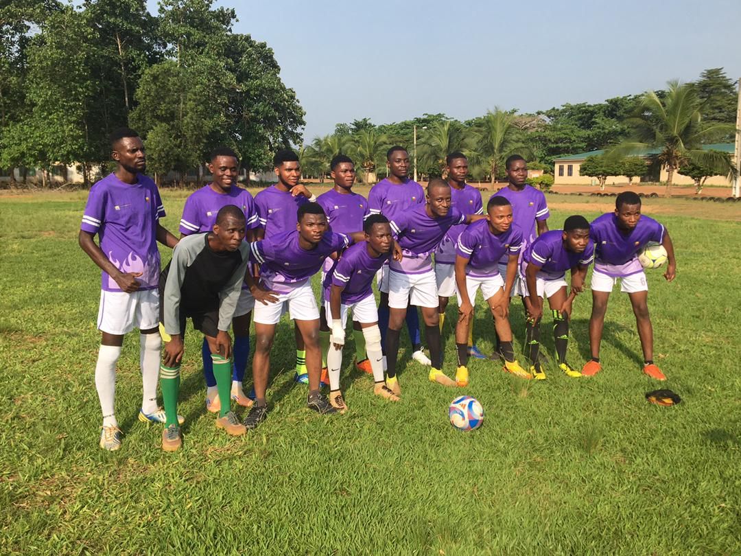 BTC Garmenting team members playing a friendly football match, celebrating teamwork and employee bonding.